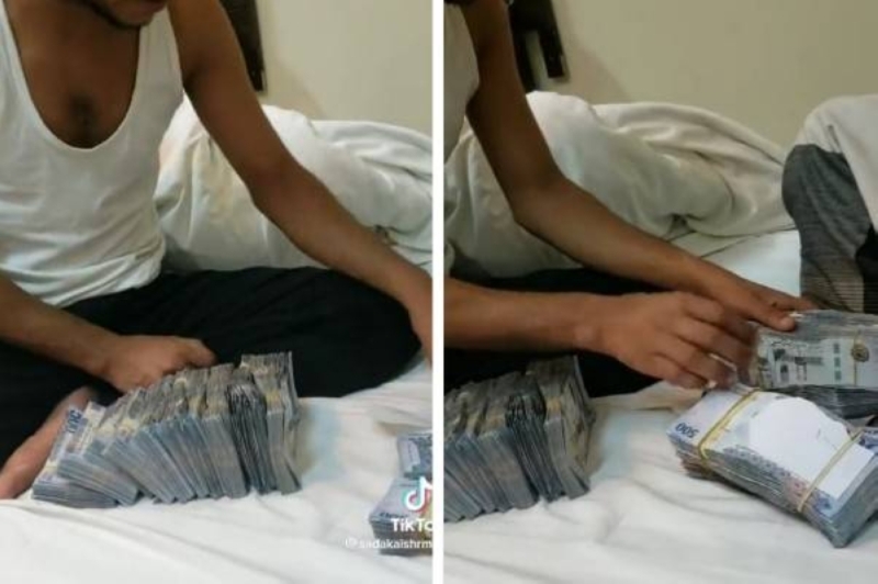 من قلب السعودية.. مقيم يمني يستعرض كمية ضخمة من النقود يشعل مواقع التواصل و يثير غضباً واسعاً .. صورة